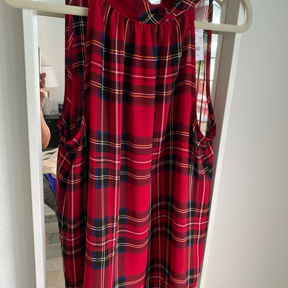 Holiday glam bundled with classic plaid and a halter style!